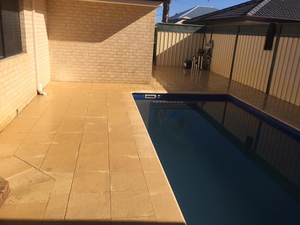Limestone pavers around pool area in Perth home